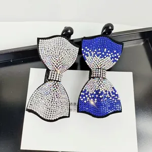 Elegantes pinzas para el cabello con lazos de diamantes en plata y azul real