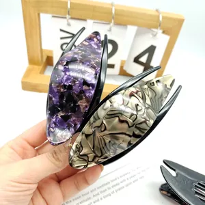 Elegant large acetate hair claws with marble and tiger patterns for thick hair