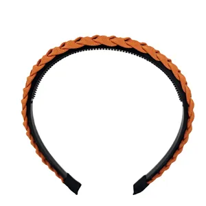 French retro braided headband in orange-brown fabric with anti-slip inner teeth