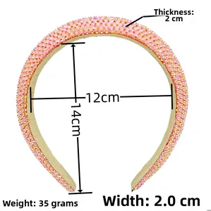 Detailed view of pink rhinestone headband with 2cm width and sponge padding specs