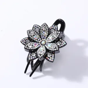 Close-up of sparkling rhinestone lotus hair claw clip with exquisite crystal flower detail