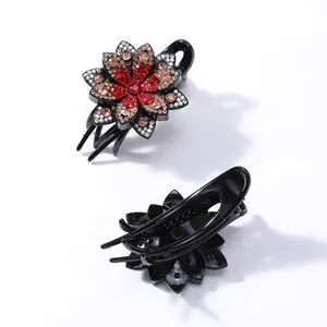 Elegant floral hair claw clip with sparkling rhinestones in black resin for women