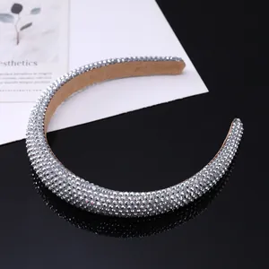 Detail of silver rhinestone headband with sparkling crystals and soft velvet lining