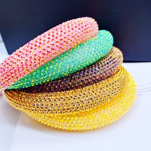 Macro detail of sparkling rhinestone sponge headbands in multiple pastel summer colors