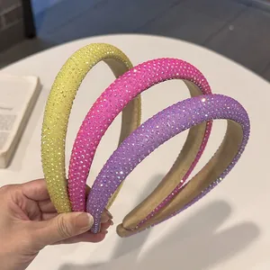 Padded rhinestone headbands in yellow, pink and purple with thick sponge base