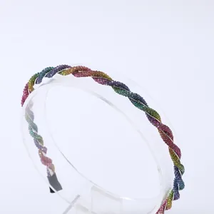 Macro shot of twisted rainbow rhinestone headband with comfortable black ends