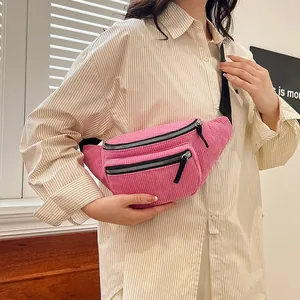 Pink corduroy chest bag for women with adjustable strap and dual zipper pockets