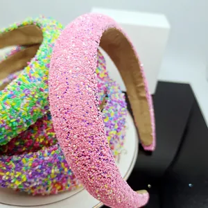 Detail of candy-colored glitter sprinkles on a thick sponge headband for women