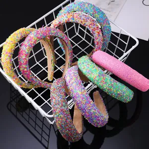 Detail of wide sponge headbands with colorful glitter sequins and soft velvet lining