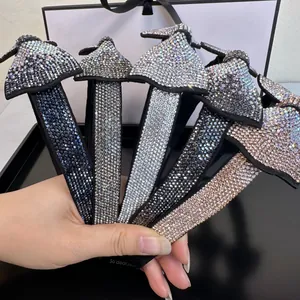Serre-têtes scintillants avec nœuds en strass en noir, argent et doré