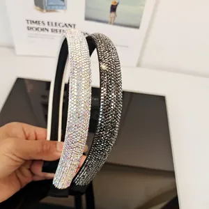 Detailed close-up of luxury rhinestones on slim headbands with non-slip fabric lining