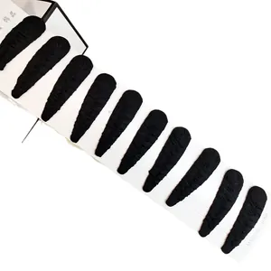 Set of 10 black fabric hair clips neatly organized on a white card board for women