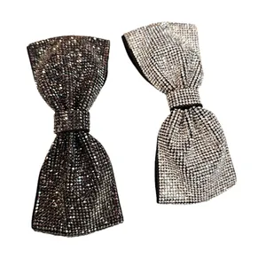 Barrettes à cheveux élégantes en forme de nœud avec strass argentés et gris
