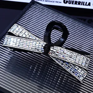Elegant large bow hair claw clip with sparkling rhinestones for thick hair styling