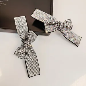 Elegant rhinestone bow hair clip set with sparkling crystal ribbons for women and girls