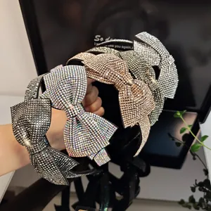 Elegant bow headbands featuring sparkly rhinestones in silver, gold, and grey colors