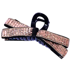 Large bow hair claw clip with champagne rhinestones for thick hair styling