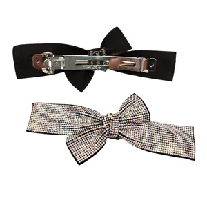 Elegant bow hair clip set with sparkling rhinestones and vintage black fabric finish