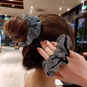 French vintage scrunchie with sparkling rhinestones for elegant hair styling