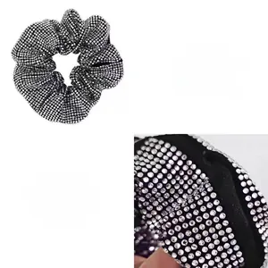 Macro detail of French style sparkling rhinestone scrunchie with durable crystal layout