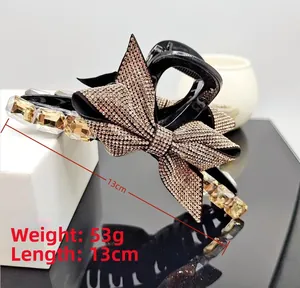 Detail of 13cm oversized hair claw clip with rhinestones, 53g weight fashion accessory