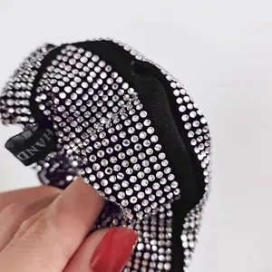 Sparkling rhinestone scrunchie with handmade label and high-shine crystal beads