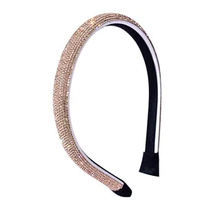 Elegant thin headband with champagne rhinestones on a sleek silver base for women