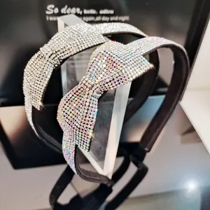 Sparkling rhinestone bow headband for women with silver glitter and crystal accents