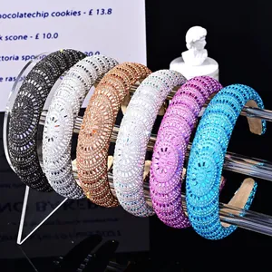 Detailed view of six colorful baroque crystal sponge headbands with sparkling rhinestones