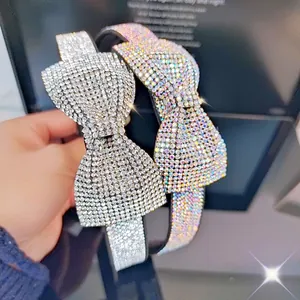 Detailed view of handmade sparkling rhinestone bow headbands with silver and AB crystal stones