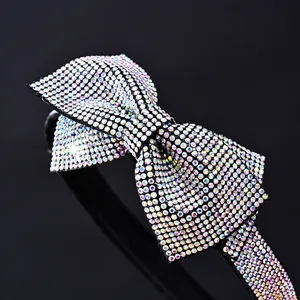 Close-up of sparkling colorful AB rhinestones on a large bow headband for women