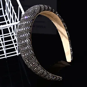 Close-up of luxury padded headband with dark grey crystals and rectangle rhinestones