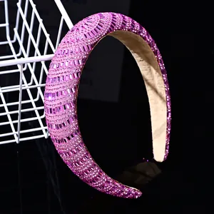 Macro detail of the sparkling pink rhinestones and crystals on the padded baroque headband