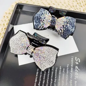 French vintage style bow hair claw clip with sparkling rhinestones in elegant black finish