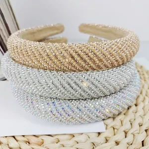 Detailed close-up of pearl and rhinestone headbands in gold, white and silver finishes