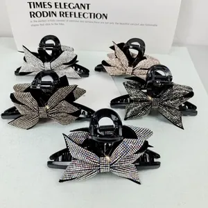 Eleganti mollette per capelli a fiocco con strass in cinque colori, argento e champagne
