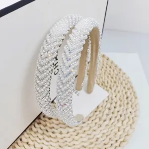 Elegant white pearl and rhinestone headband for a stylish high skull top hair accessory