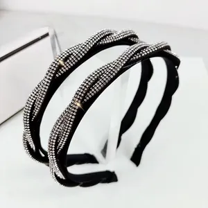 Set of two luxury twisted black headbands with sparkling silver rhinestones for women