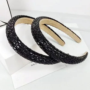 Set of two black padded headbands featuring square rhinestones and non-slip velvet lining