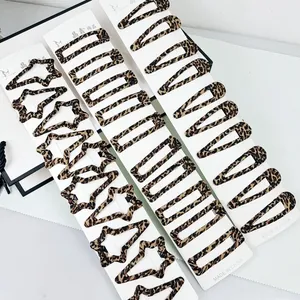 Detailed display of leopard print hair clip set in star, rectangle and drop shapes