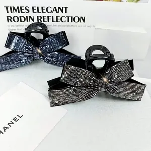 Pinces à cheveux nœud élégantes avec strass en bleu marine et argent pour femmes
