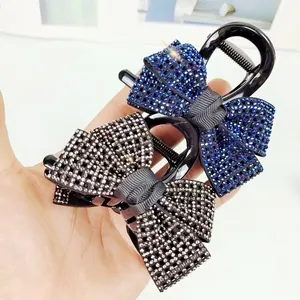 Fonkelende strik haarklemmen met strassteentjes in marineblauw en zilver voor elegantie