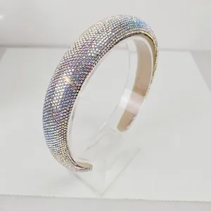 Detail showing high-end padded headband with sparkling crystals and plush inner lining