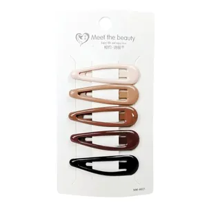5-piece set of star milk tea color BB hair clips on a white card display