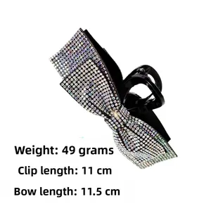 Detail view of rhinestone bow hair claw clip showing 11.5cm length and 49g weight