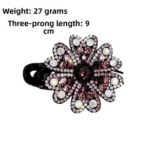 Detailed view of 9cm floral hair claw clip with colorful rhinestones weighing 27g