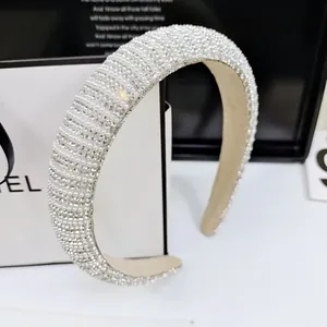Elegant wide padded headband with sparkling rhinestones and pearls for a luxury look
