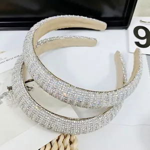 Detailed view of handmade wide headbands with iridescent AB rhinestones and silver crystals