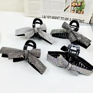 Lot de quatre pinces à cheveux avec nœud en strass brillants accessoires élégants