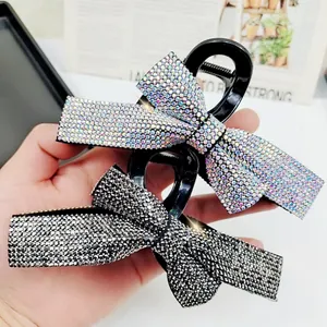 Pinces à cheveux élégantes en forme de nœud avec strass brillants pour coiffure chic